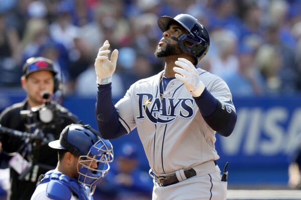 Tampa Bay Rays' Yandy Diaz reacts after hitting a three run home-run during the second inning of a baseball game against the Toronto Blue Jays in Toronto, Thursday, Sept. 15, 2022. (Frank Gunn/The Canadian Press via AP)