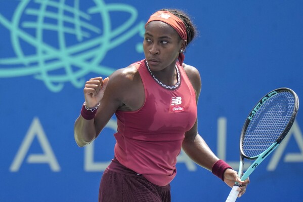 CORRECTS THAT SAKKARI IS FROM GREECE, NOT GERMANY - Coco Gauff, of the United States, celebrates after a point against Maria Sakkari, of Greece, during the women's singles final of the DC Open tennis tournament Sunday, Aug. 6, 2023, in Washington. (AP Photo/Alex Brandon)
