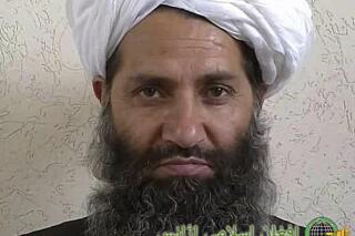 FILE - In this undated photo from an unknown location, the leader of Taliban fighters, Mullah Haibatullah Akhundzada poses for a portrait. On Wednesday, July 6, 2022, Akhundzada said that Afghan soil will not be used to launch attacks against other countries, and he asked the international community to not interfere in Afghanistan’s internal affairs. Akhundzada made the assurance in an address ahead of the Eid al-Adha holiday. (Afghan Islamic Press via AP, File)