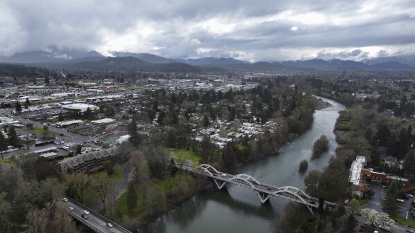 The Rogue River is seen March 22, 2024, in Grants Pass, Ore. (AP Photo/Jenny Kane, File)