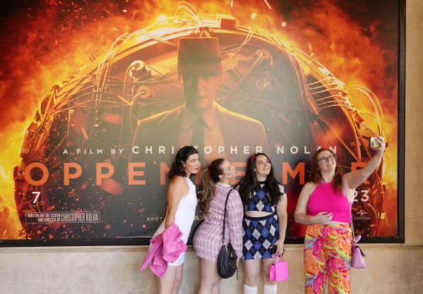 From left, Gabrielle Roitman, Kayla Seffing, Maddy Hiller and Casey Myer take a selfie in front of an 