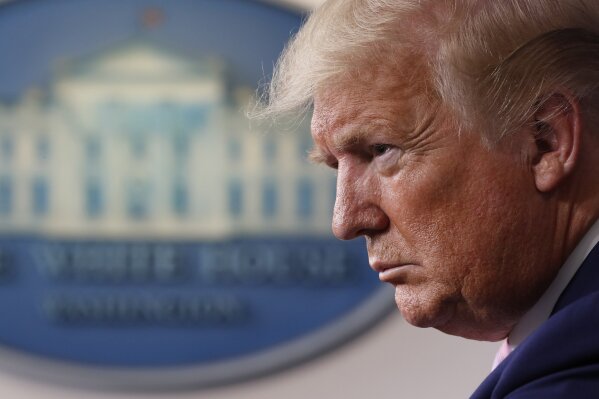 President Donald Trump listens during a briefing about the coronavirus in the James Brady Press Briefing Room of the White House, Wednesday, April 1, 2020, in Washington. (AP Photo/Alex Brandon)