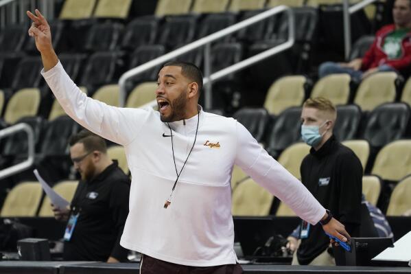 Loyola Chicago head coach Drew Valentine directs a drill during practice for the first round of the NCAA men's college basketball tournament, Thursday, March 17, 2022, in Pittsburgh. Loyola Chicago plays Ohio State on Friday. (AP Photo/Keith Srakocic)