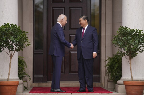 President Joe Biden greets China's President President Xi Jinping at the Filoli Estate in Woodside, Calif., Wednesday, Nov, 15, 2023, on the sidelines of the Asia-Pacific Economic Cooperative conference. (Doug Mills/The New York Times via AP, Pool)