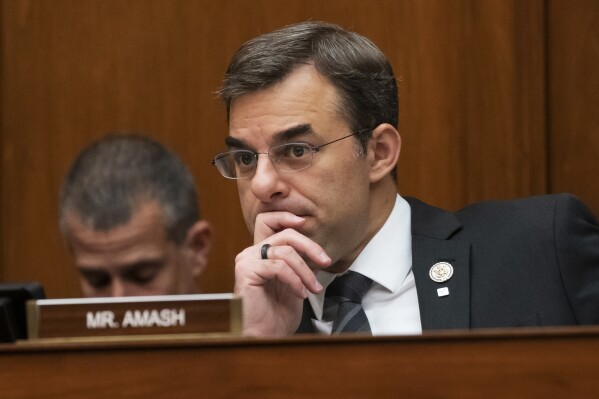 FILE - In this June 12, 2019, file photo, Rep. Justin Amash, R-Mich., listens to debate on Capitol Hill in Washington. Amash announced Thursday, Feb. 29, 2024 that he would enter the race for Michigan's open U.S. Senate seat. Amash will pursue the Republican nomination in the race. (AP Photo/J. Scott Applewhite, File)