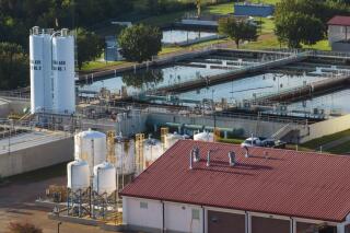 FILE - This is an aerial view of of the city of Jackson, Miss.'s O.B. Curtis Water Plant in Ridgeland, Miss., Sept. 1, 2022. Mississippi Gov. Tate Reeves signed legislation Friday, April 14, 2023, requiring localities to base water bills on personal consumption, blocking a proposed reform by the federally appointed manager of the troubled water system in the state's capital city. (AP Photo/Steve Helber, File)