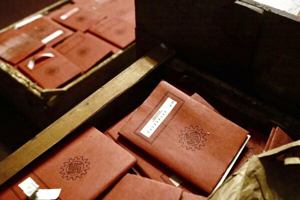 In this photo released by Argentina's Supreme Court on Sunday, May 11, 2025, documents associated with the Nazi regime sit in boxes found by staffers in the court's archives in Buenos Aires, Argentina, as they prepared a museum of historical records.(Argentina Supreme Court via AP)