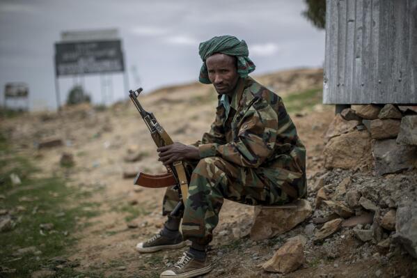 A fighter loyal to the Tigray People's Liberation Front mans a guard post on the outskirts of the town of Hawzen, then-controlled by the group, in the Tigray region of northern Ethiopia, on Friday, May 7, 2021. The battle for Hawzen is part of a larger war in Tigray between the Ethiopian government and the Tigrayan rebels that has led to massacres, gang rapes and the flight of more than 2 million of the region’s 6 million people. (AP Photo/Ben Curtis)