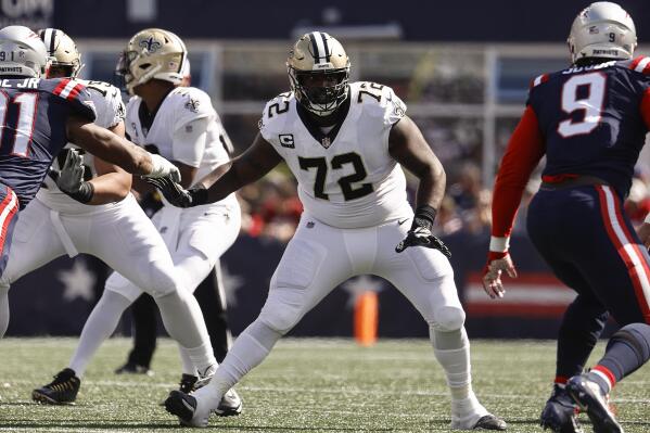 FILE - New Orleans Saints offensive tackle Terron Armstead looks to block against the New England Patriots during an NFL football game Sept. 26, 2021, in Foxborough, Mass. Armstead announced Tuesday night, March 22, that he’s signing with the Miami Dolphins. (AP Photo/Winslow Townson, File)