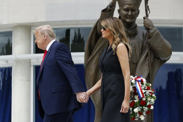 President Donald Trump and first lady Melania Trump depart after visiting Saint John Paul II National Shrine, Tuesday, June 2, 2020, in Washington. (AP Photo/Patrick Semansky)