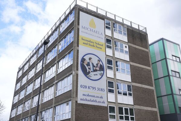 Exterior view of the 'Michaela Community School' in Brent, north west London, England, Tuesday, April 16, 2024. A Muslim student who wanted to pray during lunchtime has lost a court fight against a strict London school that had banned prayer on campus. A High Court judge said Tuesday that the female student had accepted when she enrolled in the school that she would be subject to religious restrictions. (Lucy North/PA via AP)