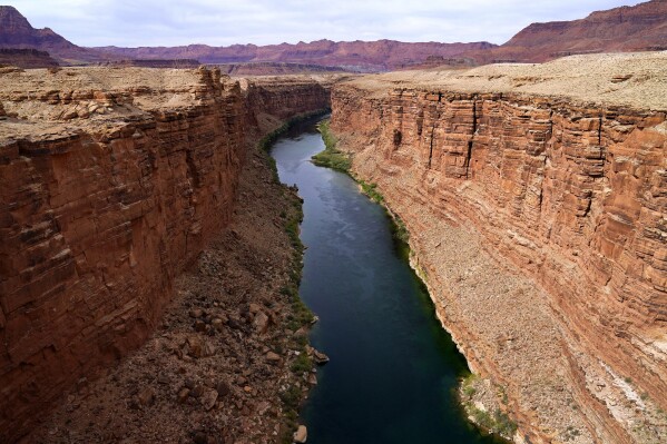 FILE - The Colorado River in the upper River Basin is pictured in Lees Ferry, Ariz., on May 29, 2021. The Supreme Court has ruled against the Navajo Nation in a dispute involving water from the drought-stricken Colorado River. States that draw water from the river — Arizona, Nevada and Colorado — and water districts in California had urged the court to decide for them, and that's what the justices did in a 5-4 ruling. (AP Photo/Ross D. Franklin, File)