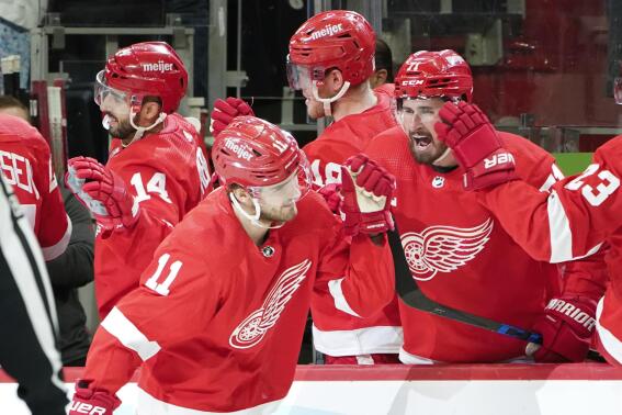 Detroit Red Wings right wing Filip Zadina (11) celebrates his goal against the Calgary Flames in the third period of an NHL hockey game Thursday, Feb. 9, 2023, in Detroit. (AP Photo/Paul Sancya)