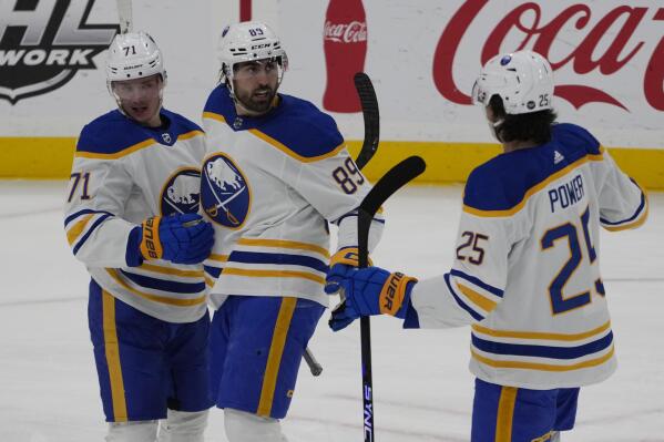 Teammates congratulate Buffalo Sabres right wing Alex Tuch (89) after scoring a goal during the second period of a NHL hockey game against the Florida Panthers, Friday, Feb. 24, 2023, in Sunrise, Fla. (AP Photo/Marta Lavandier)