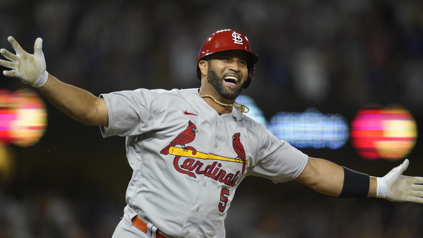 Pujols concludes STL return with 2 hits, Molina jersey swap