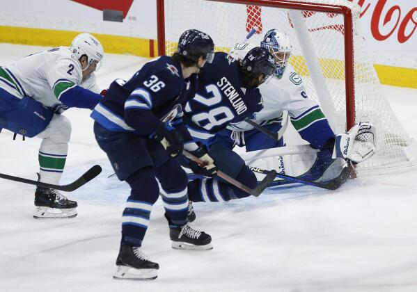 Scheifele's hat-trick propels Jets past Canucks in Gagner's 1,000th game -  Winnipeg