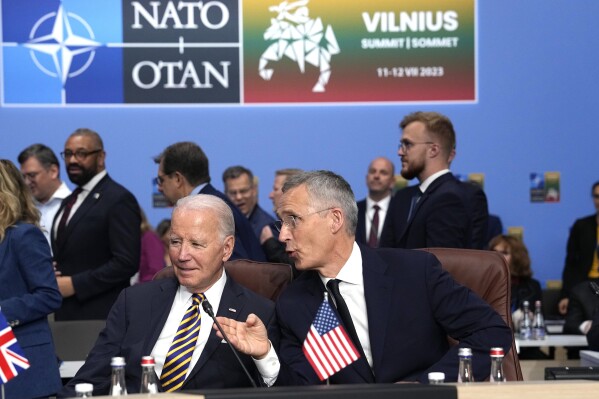 FILE - NATO Secretary General Jens Stoltenberg, right, speaks with United States President Joe Biden during a meeting of the NATO-Ukraine Council during a NATO summit in Vilnius, Lithuania, July 12, 2023. The Pentagon confirms that a senior Defense Department official who attended last years’ NATO summit in Lithuania had symptoms similar to those reported by U.S. officials who have experienced “Havana syndrome." (AP Photo/Pavel Golovkin, File)