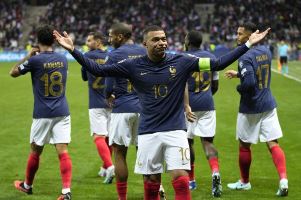 France's Kylian Mbappe celebrates after a goal during the Euro 2024 group B qualifying soccer match between France and Gibraltar in Nice, France, Saturday, Nov. 18, 2023. (AP Photo/Daniel Cole)