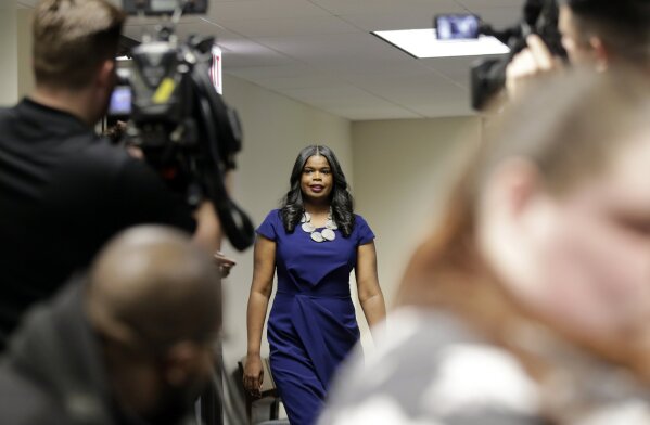 
              Cook County State's Attorney Kim Foxx arrives at a news conference, Friday, Feb. 22, 2019, in Chicago. R. Kelly, the R&B star who has been trailed for decades by lurid rumors that made him Public Enemy No. 1 to the MeToo movement, was charged with 10 counts of aggravated sexual abuse involving multiple victims. After the latest documentary Foxx, said she was "sickened" by the allegations and asked potential victims to come forward. (AP Photo/Kiichiro Sato)
            