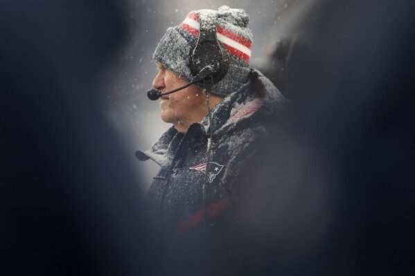 New England Patriots head coach Bill Belichick watches from the sidelines during the first half of an NFL football game against the New York Jets, Sunday, Jan. 7, 2024, in Foxborough, Mass. (AP Photo/Michael Dwyer)
