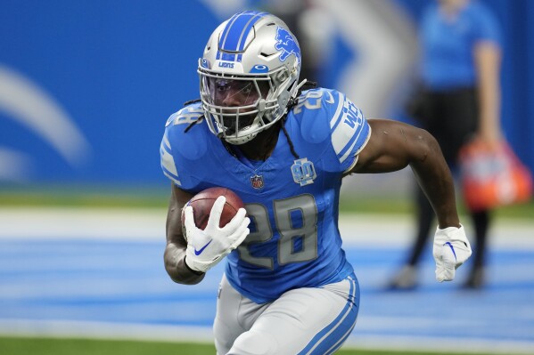 FILE - Detroit Lions running back Jermar Jefferson (28) warms up before the first half of a preseason NFL football game between the Detroit Lions and the Jacksonville Jaguars, Saturday, Aug. 19, 2023, in Detroit. he Detroit Lions are counting on running backs David Montgomery, in his fifth season, and rookie Jahmyr Gibbs to give them a strong ground game for the second straight year. (AP Photo/Paul Sancya, File)