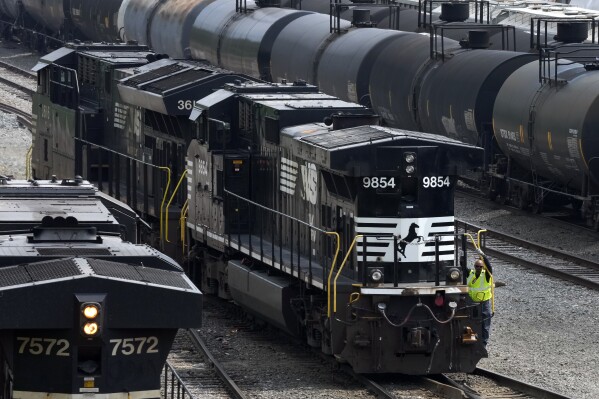 Norfolk Southern locomotives are moved through the Conway Terminal in Conway, Pa., Saturday, June 17, 2023. Norfolk Southern reports their earnings Friday, Jan. 26, 2024. (AP Photo/Gene J. Puskar)