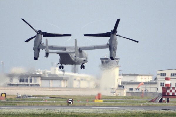 FILE - A U.S. military CV-22 Osprey takes off from Iwakuni base, Yamaguchi prefecture, western Japan, on July 4, 2018. The military has greenlighted its Osprey to return to flight, three months after a part failure led to the deaths of eight service members in a crash in Japan in November. Naval Air Systems Command announced it on Friday.(Kyodo News via AP, File)