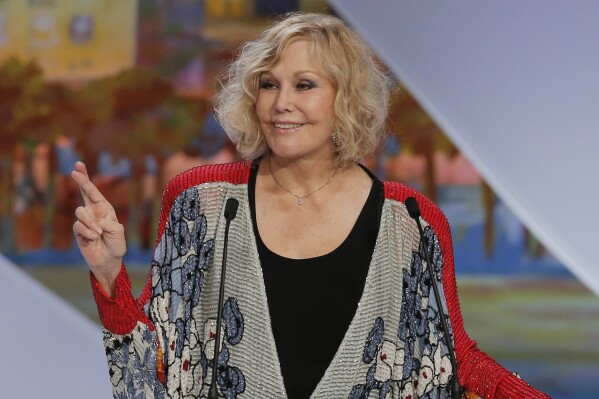 Actress Kim Novak presents the Grand Prix award at the 66th international film festival, in Cannes, southern France, on May 26, 2013. (AP Photo/Francois Mori, File)
