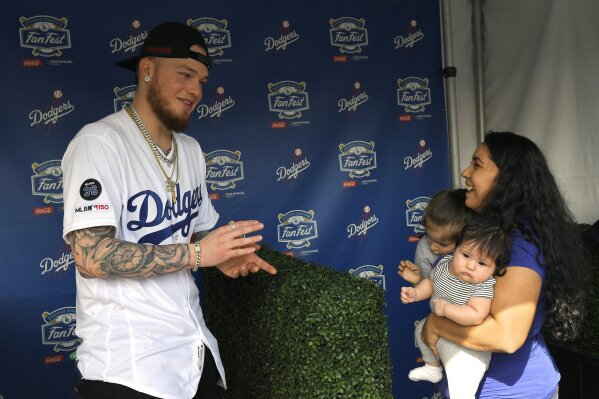 Los Angeles Dodgers outfielder Alex Verdugo gold chain during a