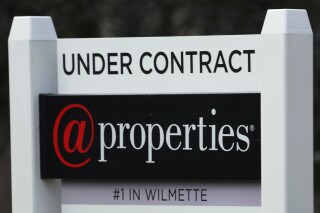 A sign announcing that a home is under contract is displayed in Wilmette, Ill., Thursday, March 28, 2024. On Thursday, April 4, 2024, Freddie Mac reports on this week’s average U.S. mortgage rates. (AP Photo/Nam Y. Huh)