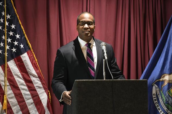 Rep. John James, R-Mich, addresses the audience after being sworn into office, Friday, Feb. 24, 2023, in Warren, Mich. James is opting against a campaign for the Senate seat being vacated by Democrat Debbie Stabenow in 2024. James filed paperwork Friday to run for reelection to his Detroit-area House seat. (AP Photo/Jose Juarez)