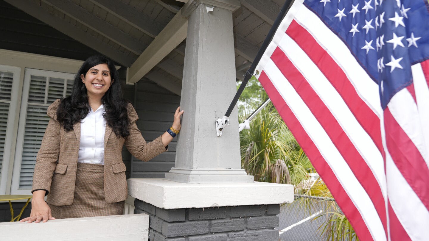Florida state Rep. Anna Eskamani poses out front of her office Wednesday, March 27, 2024, in Orlando, Fla. For the first time in 27 years, the U.S. go