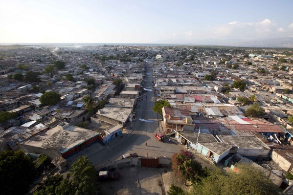 FILE - The main entrance to the Cite Soleil area of Port-au-Prince, Haiti, Dec. 11, 2018. Gang leader Iskar Andrice, who also has been identified as Iscar Andris, was killed in the Belekou neighborhood that he controlled for years within the Cite Soleil, local media reported on Nov. 13, 2023. (AP Photo/Dieu Nalio Chery, File)