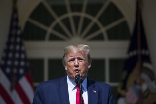In this July 29, 2019, photo, President Donald Trump speaks before signing H.R. 1327, an act ensuring that a victims' compensation fund related to the Sept. 11 attacks never runs out of money, in the Rose Garden of the White House in Washington. (AP Photo/Alex Brandon)