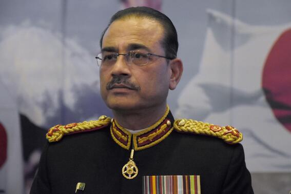 FILE - Pakistan army Lt. Gen. Syed Asim Munir attends a ceremony in Islamabad, Pakistan, Nov. 1, 2022. Munir, a former spymaster, takes charge as Pakistan's new military chief amid a government standoff with former prime minister Imran Khan and the end of a monthslong cease-fire between the government and the Pakistani Taliban. (AP Photo/W.K. Yousufzai, File)