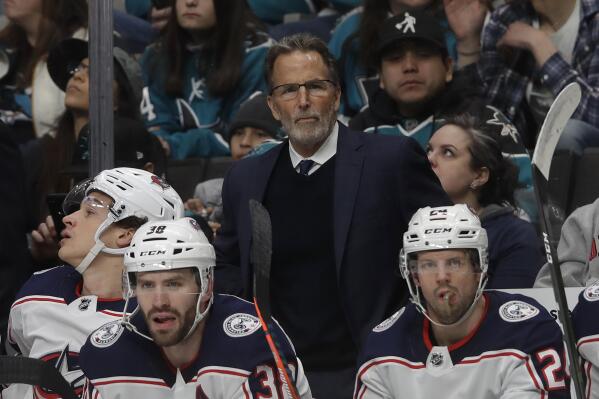 FILE - In this Jan. 9, 2020, file photo, Columbus Blue Jackets head coach John Tortorella, center, looks on during an NHL hockey game against the San Jose Sharks in San Jose, Calif. Tortorella is out as coach of the Columbus Blue Jackets after six seasons. (AP Photo/Jeff Chiu, File)