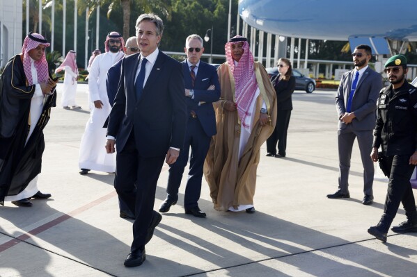 U.S. Secretary of State Antony Blinken walks as he arrives in Jeddah, Saudi Arabia, Wednesday, March 20, 2024. (Evelyn Hockstein, Pool Photo via AP)