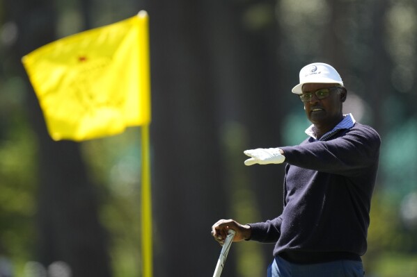 Vijay Singh, Fiji, lines up a putt on the third hole during third round at the Masters golf tournament at Augusta National Golf Club Saturday, April 13, 2024, in Augusta, Ga. (AP Photo/Matt Slocum)