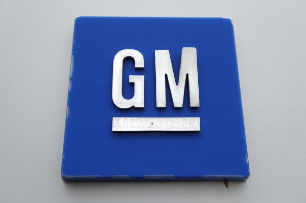 FILE - The General Motors logo is seen, Jan. 27, 2020, in Hamtramck, Mich. General Motors said Wednesday, Aug. 23, 2023, that it will close a large computer center near Phoenix at the end of October, eliminating 940 jobs. (AP Photo/Paul Sancya, File)