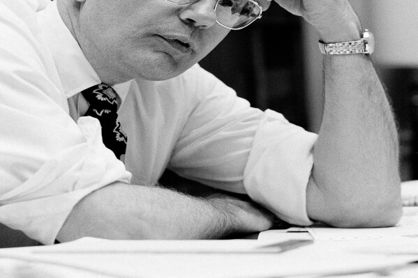
              FILE - In a June 12, 1979 file photo, Rep. John Dingell, D-Mich., comments on President Jimmy Carter during an interview in his Capitol Hill office in Washington. Dingell, the longest-serving member of Congress in American history who mastered legislative deal-making and was fiercely protective of Detroit's auto industry, has died at age 92. Dingell, who served in the U.S. House for 59 years before retiring in 2014, died Thursday, Feb. 7, 2019, at his home in Dearborn, said his wife, Congresswoman Debbie Dingell. (AP Photo/John Duricka, File)
            