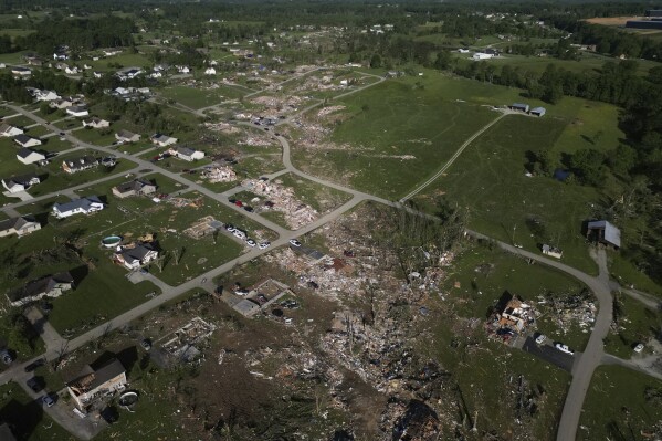 A path of destroyed homes is seen, Sunday, May 18, 2025, in London, Ky., after a severe storm passed through the area. (AP Photo/Carolyn Kaster)