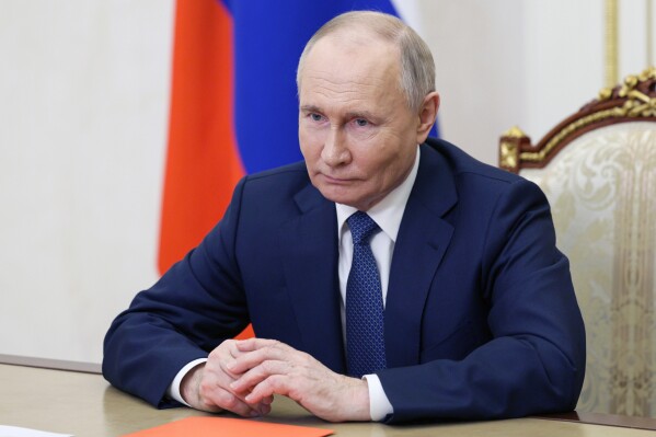 Russian President Vladimir Putin holds a meeting with members of the Security Council via videoconference at the Kremlin in Moscow, Russia, Monday, May 13, 2024. (Aleksey Babushkin, Sputnik, Kremlin Pool Photo via AP)