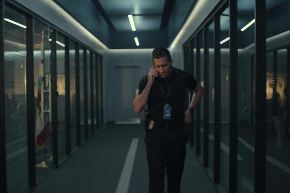 This image released by Netflix shows Jake Gyllenhaal in a scene from "The Guilty." (Netflix via AP)