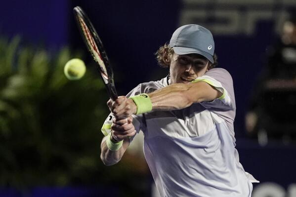 Alex de Minaur of Australia hits a return to Tommy Paul of the United States in the final match at the Mexican Open tennis tournament in Acapulco, Mexico, Saturday, March 4, 2023. (AP Photo/Eduardo Verdugo)