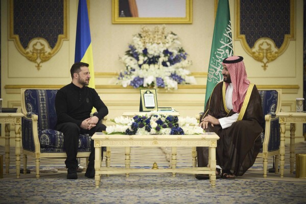 CORRECTS CITY - In this photo provided by the Ukrainian Presidential Press Office, Ukrainian President Volodymyr Zelenskyy, left, meets with Saudi's Crown Prince Mohammed bin Salman at the Royal Palace in Jeddah, Saudi Arabia, Monday, March 10, 2025. (Ukrainian Presidential Press Office via AP)