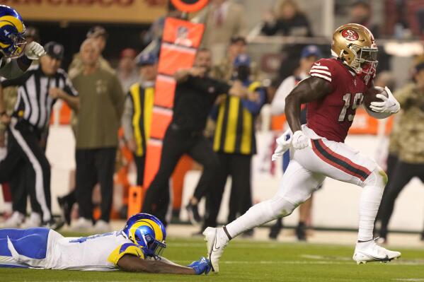 San Francisco 49ers wide receiver Deebo Samuel (19) is upended by