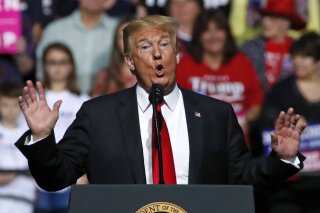
              President Donald Trump speaks at a rally in Wheeling, W.Va., Saturday, Sept. 29, 2018. (AP Photo/Gene J. Puskar)
            