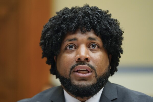 FILE - Greg Jackson, Jr., executive director of Community Justice Action Fund, speaks during a House Committee on Oversight and Reform hearing on gun violence on Capitol Hill in Washington, June 8, 2022. Jackson, the deputy director of the new gun violence prevention office at the White House spent the last week in Lewiston, Maine helping the community recover from a mass shooting. (AP Photo/Andrew Harnik, Pool)