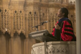 Duke Divinity School celebrate its 90th Baccalaureate service, May 14, 2016, in Duke Chapel with Eboni Marshall Turman, then a professor at Duke and now a professor at Yale Divinity School, preaching. Marshall Turman filed a lawsuit in December 2023 accusing Abyssinian Baptist Church in New York of sex discrimination for rejecting her application to become Abyssinian's senior pastor. (Duke Divinity School via AP)