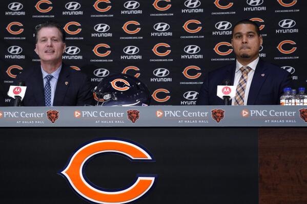 Chicago Bears new NFL football team head coach Matt Eberflus, left, and new general manager Ryan Poles listen to a question during a news conference at Halas Hall in Lake Forest, Ill., Monday, Jan. 31, 2022. (AP Photo/Nam Y. Huh)